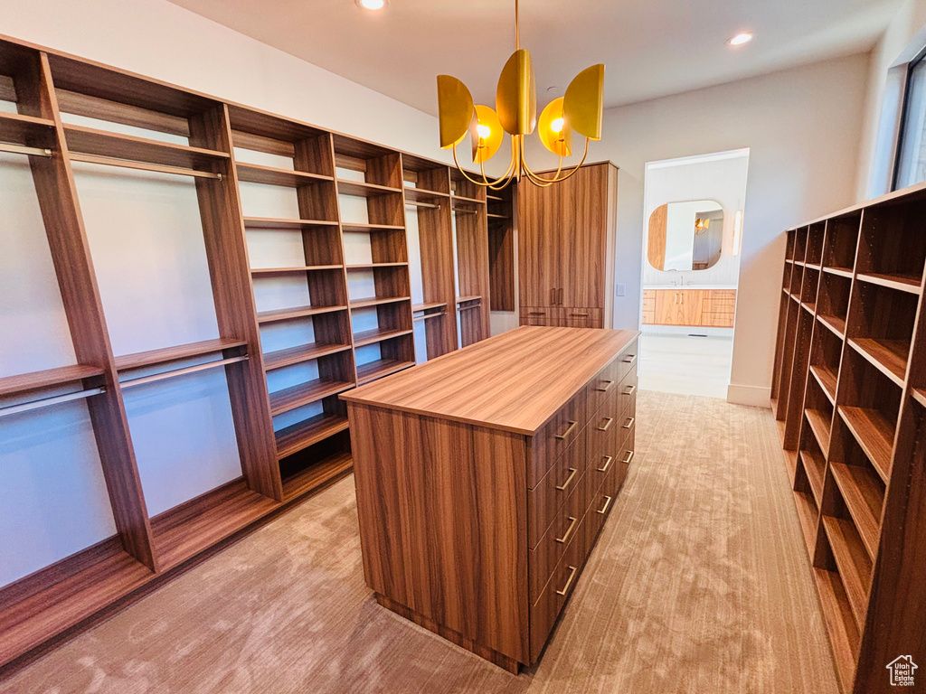 Spacious closet with a chandelier