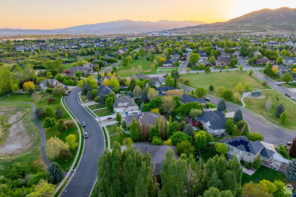 Aerial view at dusk of a mountain view and a residential view