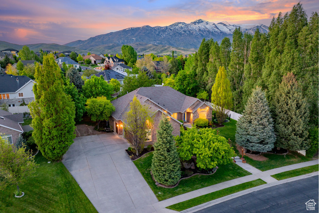 Aerial view at dusk of a mountain view and a residential view