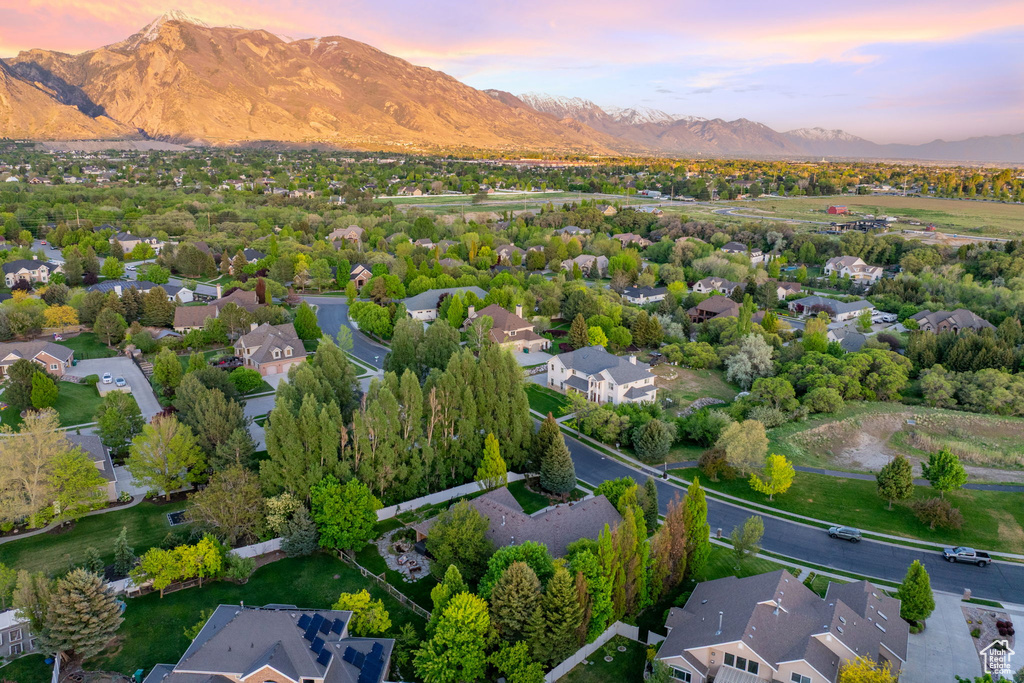 Aerial view at dusk of a mountain view and a residential view