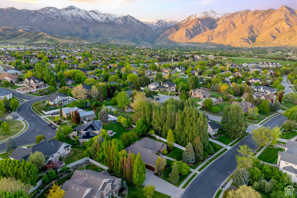 Aerial view at dusk of a mountain view and a residential view