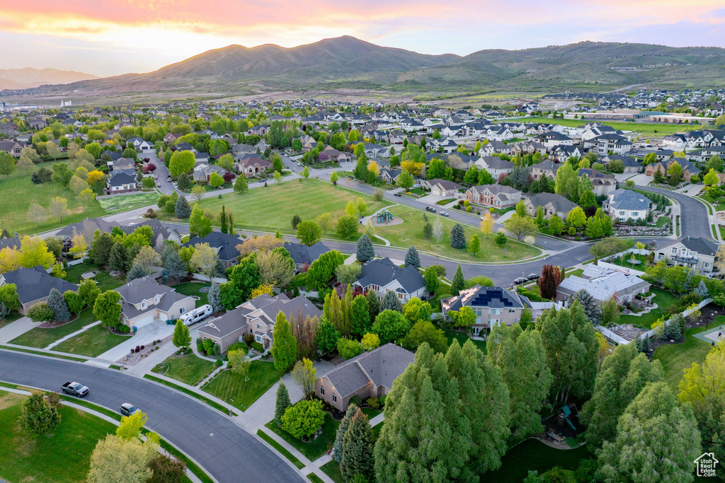 Aerial view at dusk of a mountain view and a residential view