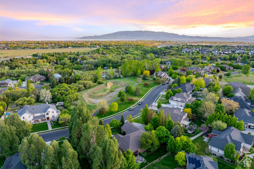 Aerial view at dusk of a mountain view and a residential view