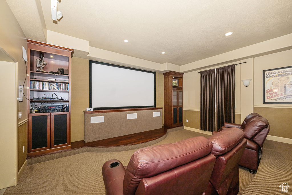 Cinema featuring carpet flooring, baseboards, and recessed lighting