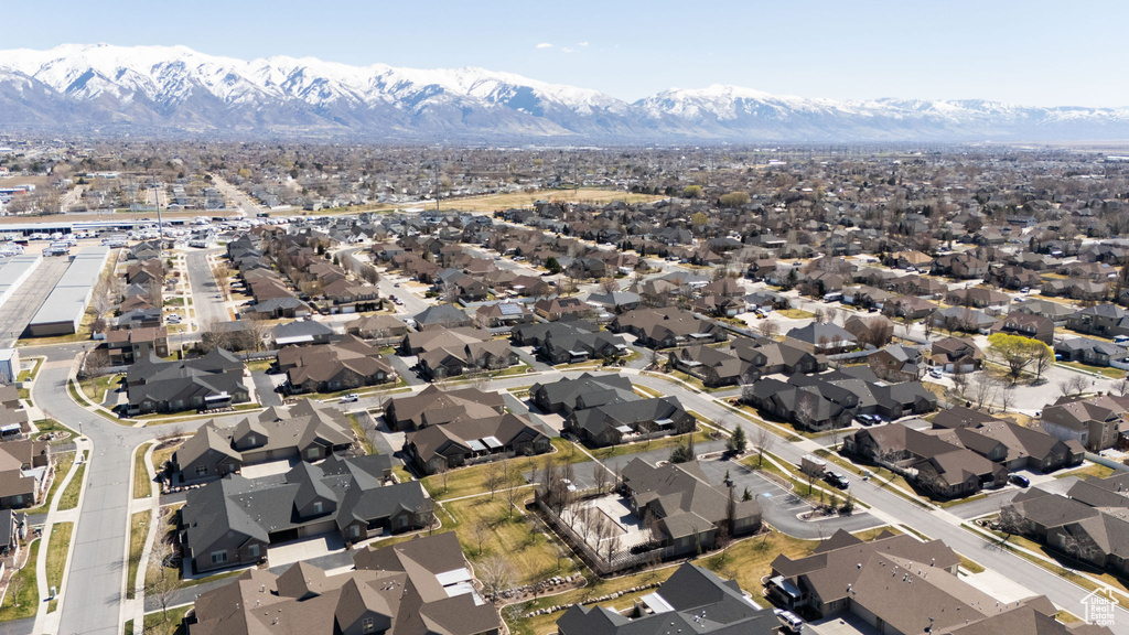 Aerial view featuring a mountain view and a residential view