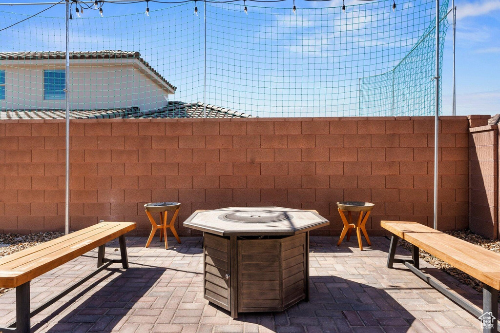 View of patio / terrace featuring fence