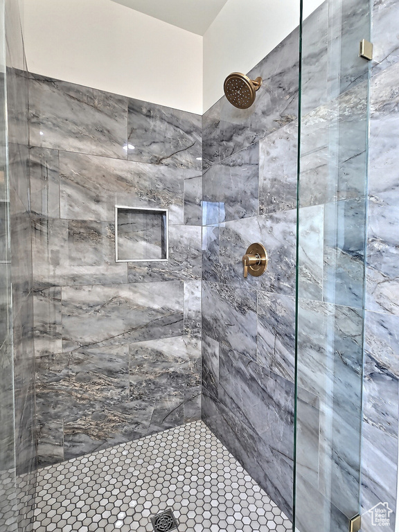 Bathroom with tiled shower