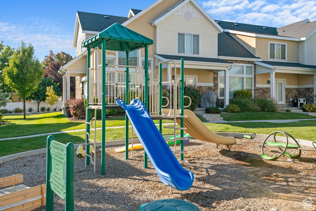 Community playground featuring a yard