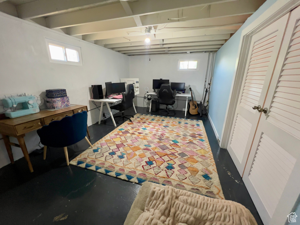 Office with healthy amount of natural light and finished concrete flooring