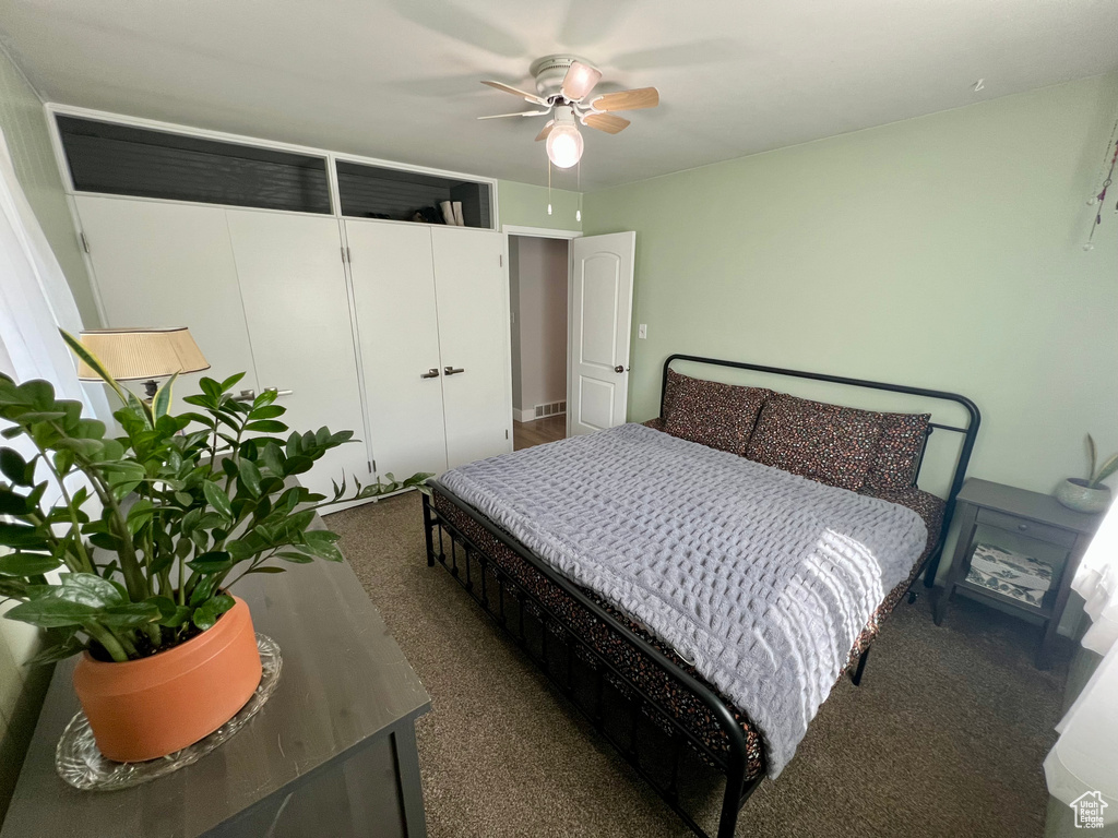 Bedroom with carpet floors and ceiling fan