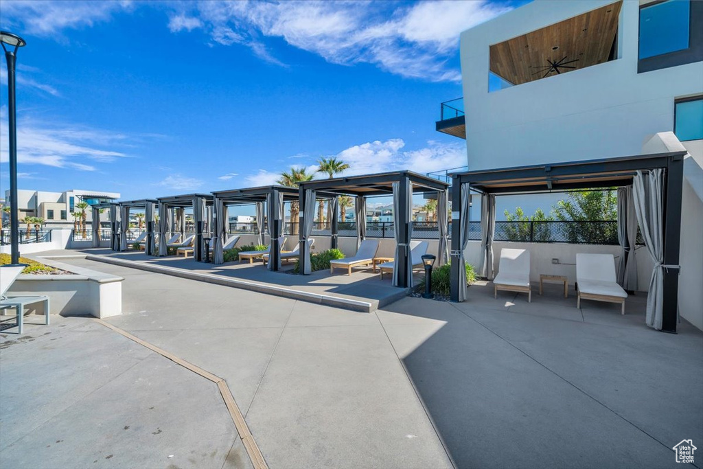 View of patio featuring a balcony