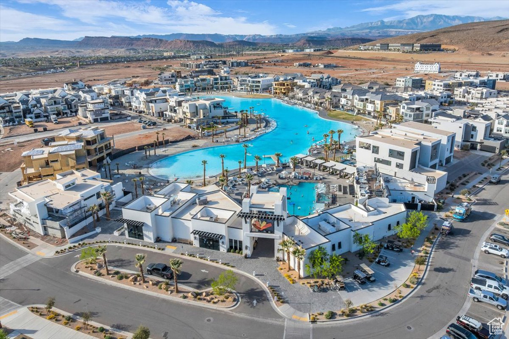 Aerial view of a mountain backdrop and a pool area