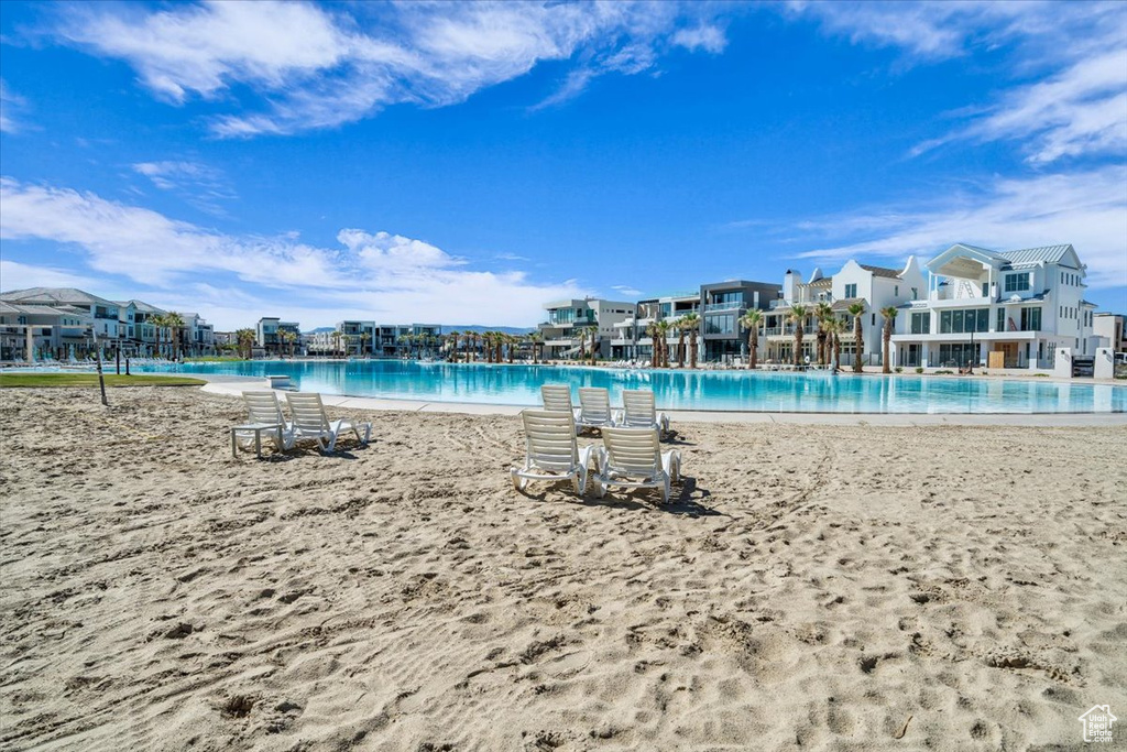 Community pool featuring a residential view