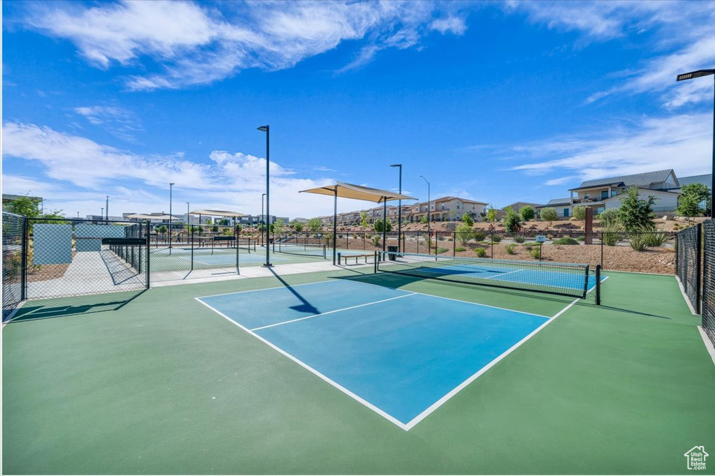 View of tennis court with fence