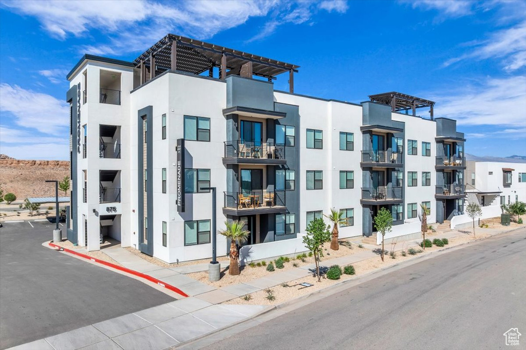 View of apartment building / complex with a mountain view