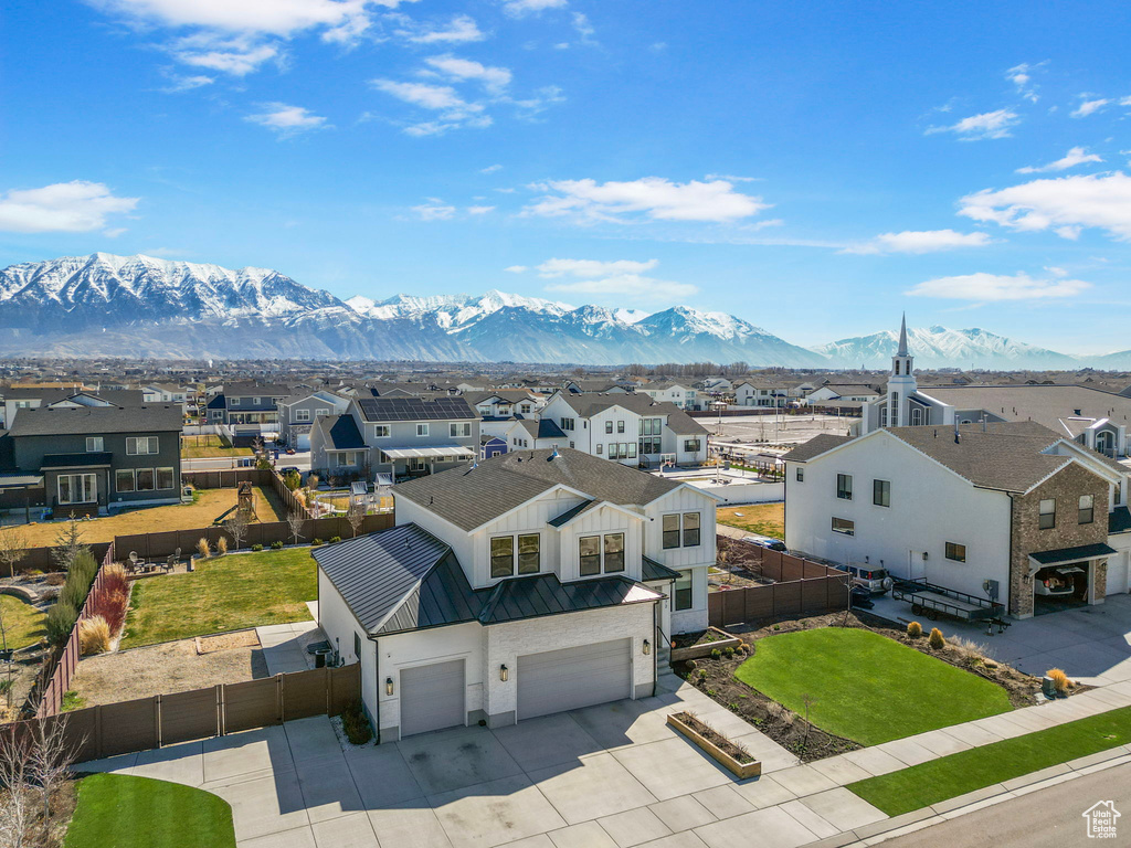 Birds eye view of property featuring a residential view and a mountain view