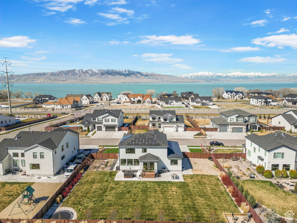 Drone / aerial view featuring a residential view and a mountain view