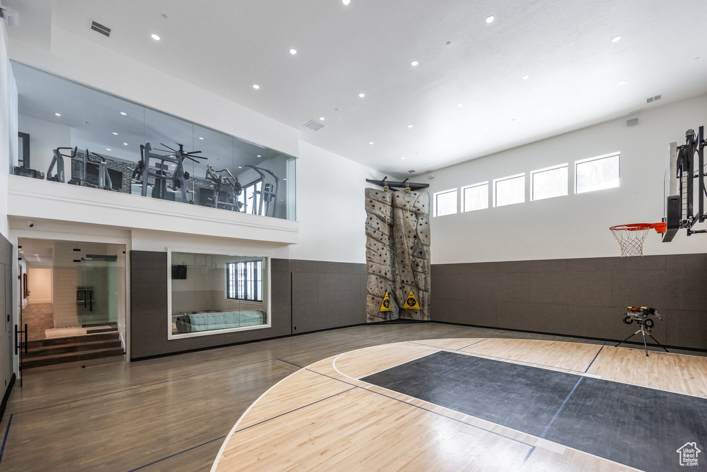 View of sport court featuring basketball hoop