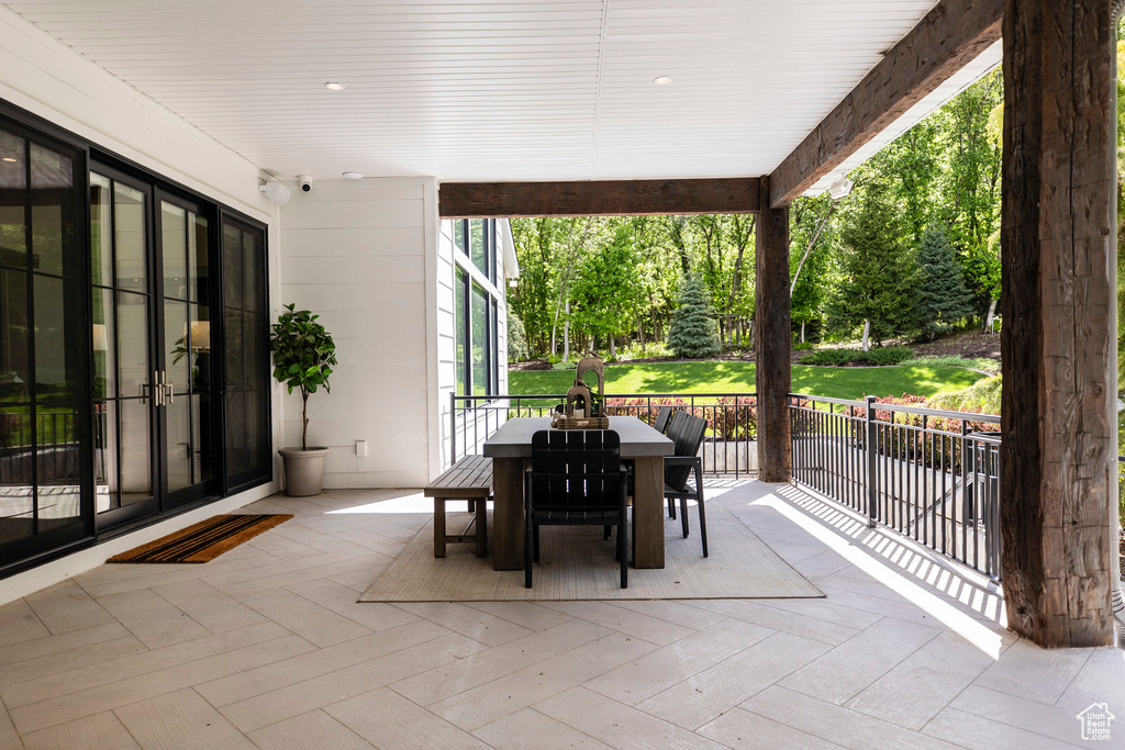 View of patio with outdoor dining area