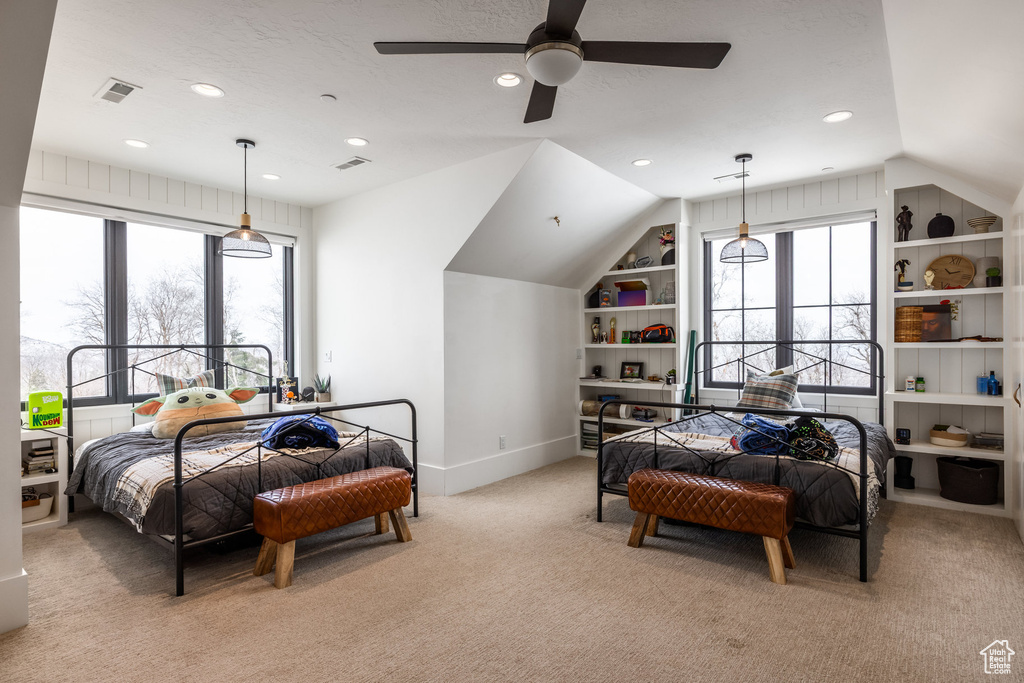 Bedroom with lofted ceiling, carpet flooring, recessed lighting, baseboards, and ceiling fan