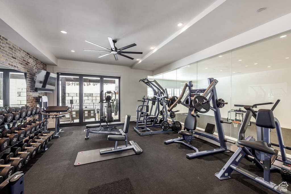 Exercise room featuring ceiling fan and recessed lighting