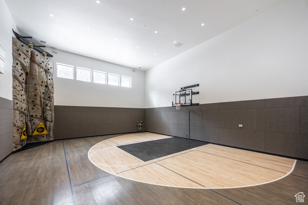 View of basketball court featuring basketball hoop