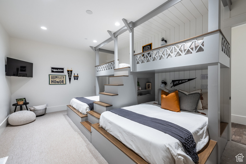 Carpeted bedroom featuring baseboards and recessed lighting