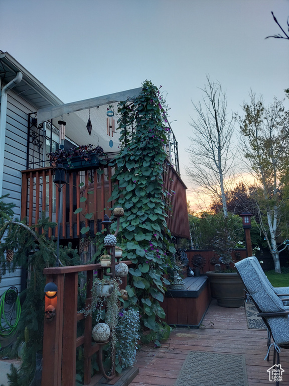 Exterior space featuring a hot tub and a deck