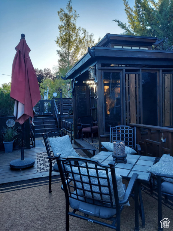 View of patio with a deck