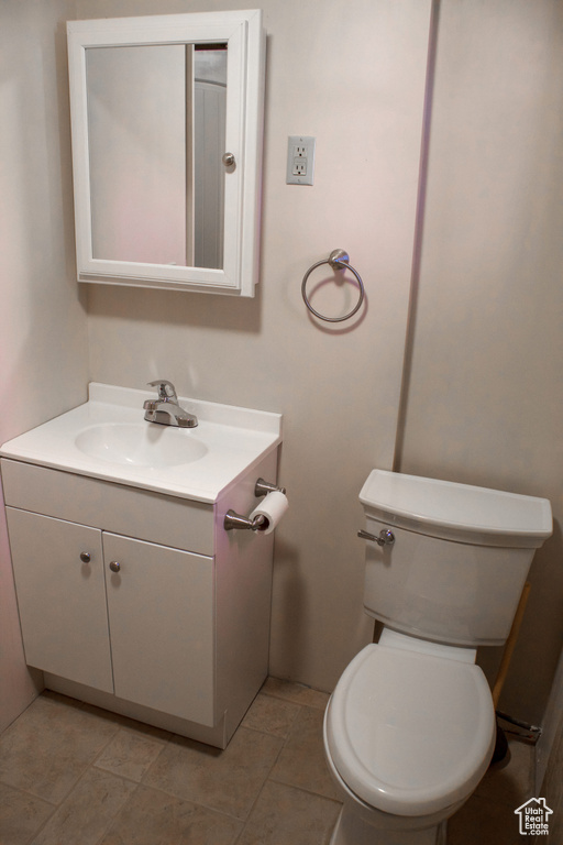 Half bath with toilet and vanity