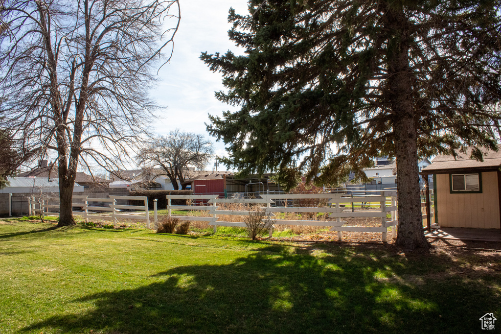 View of yard with fence
