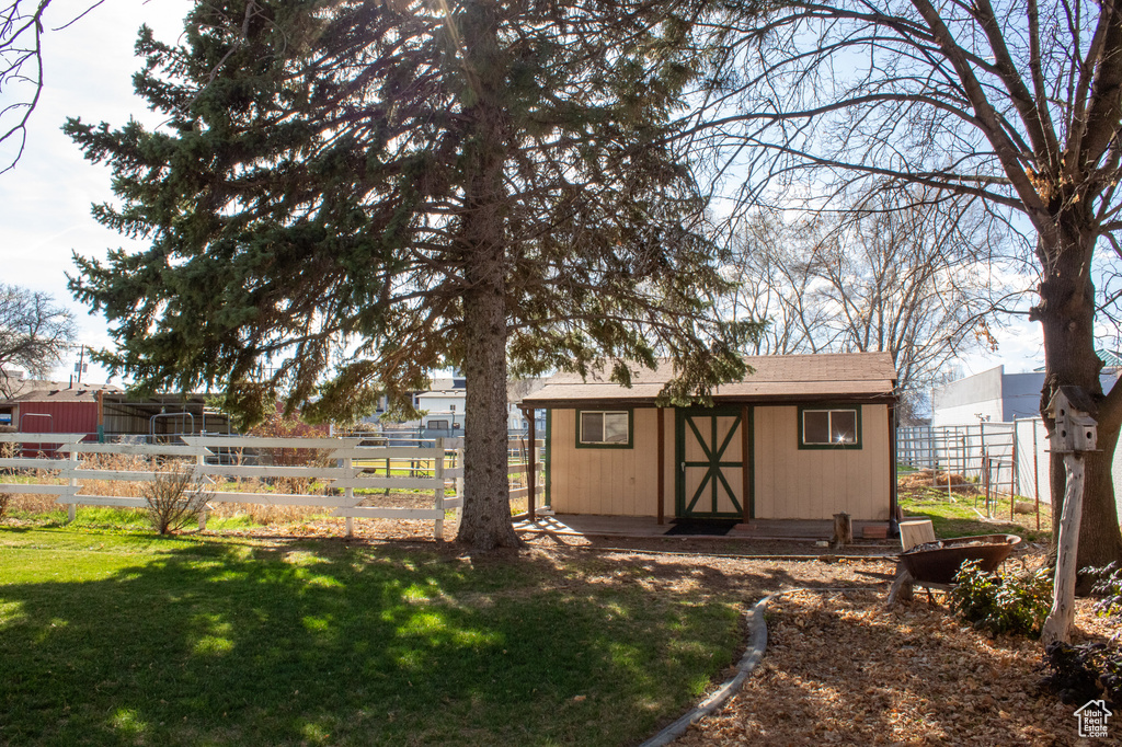 View of shed with fence