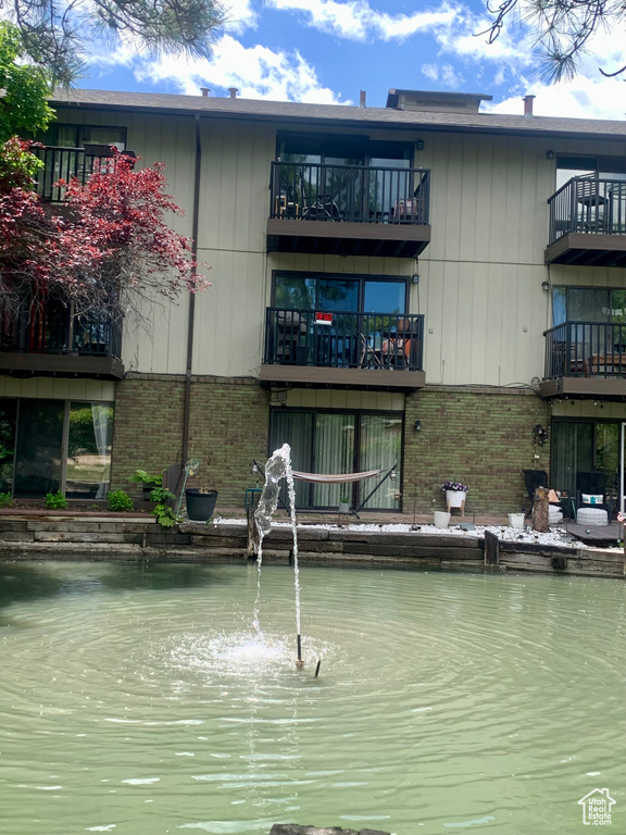 View of building exterior with a water view