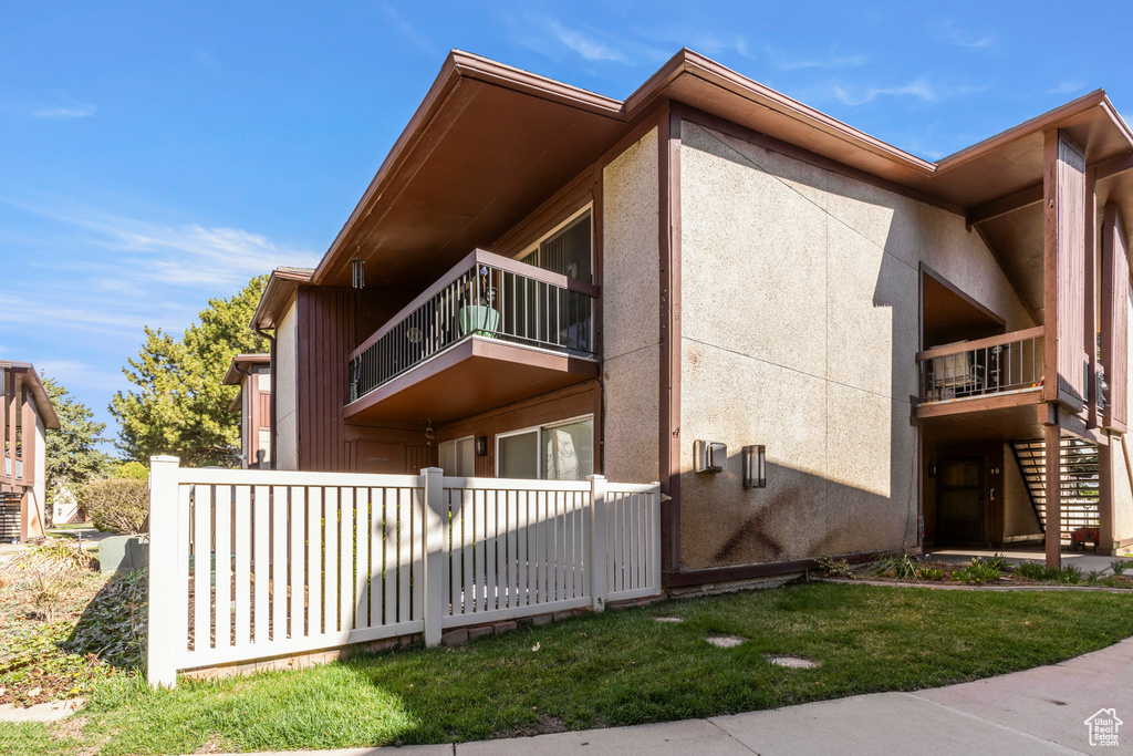 View of home\\\\\\\\\\\\\\\\\\\\\\\\\\\\\\\\\\\\\\\\\\\\\\\\\\\\\\\\\\\\\\\'s exterior with a balcony and stucco siding