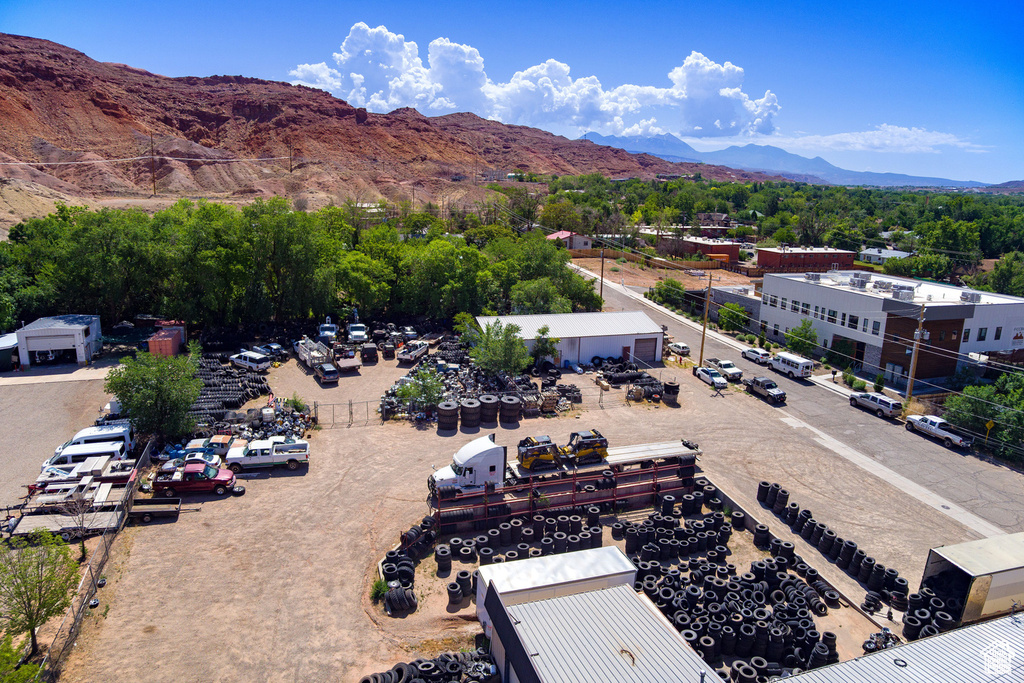 Birds eye view of property with a mountain view