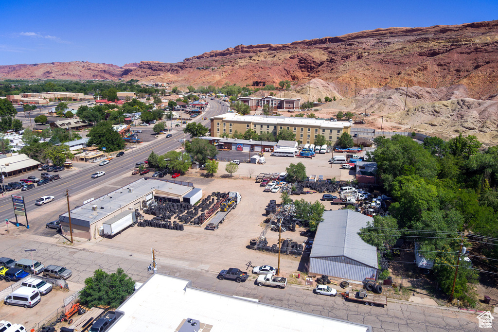 Birds eye view of property with a mountain view