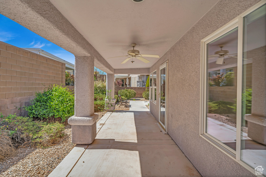 View of patio with ceiling fan