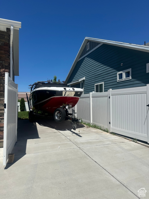 View of home\\\'s exterior featuring concrete driveway