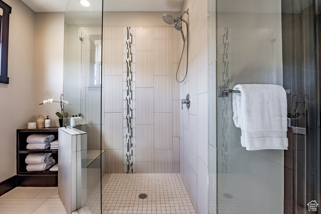 Bathroom featuring a shower stall