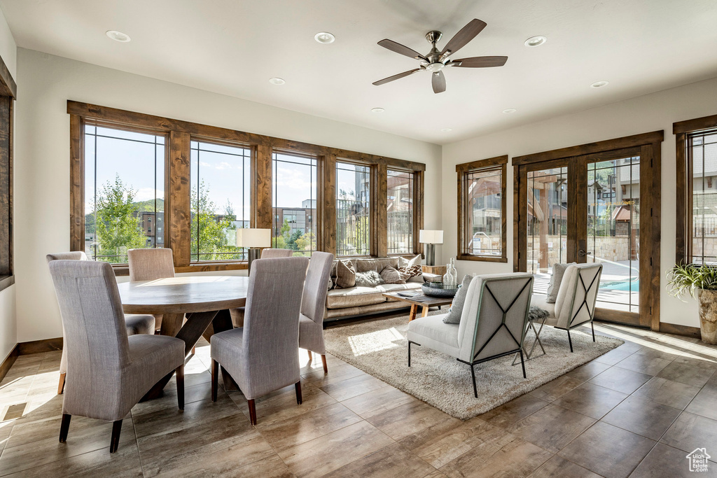 Dining area with french doors, baseboards, a ceiling fan, and recessed lighting