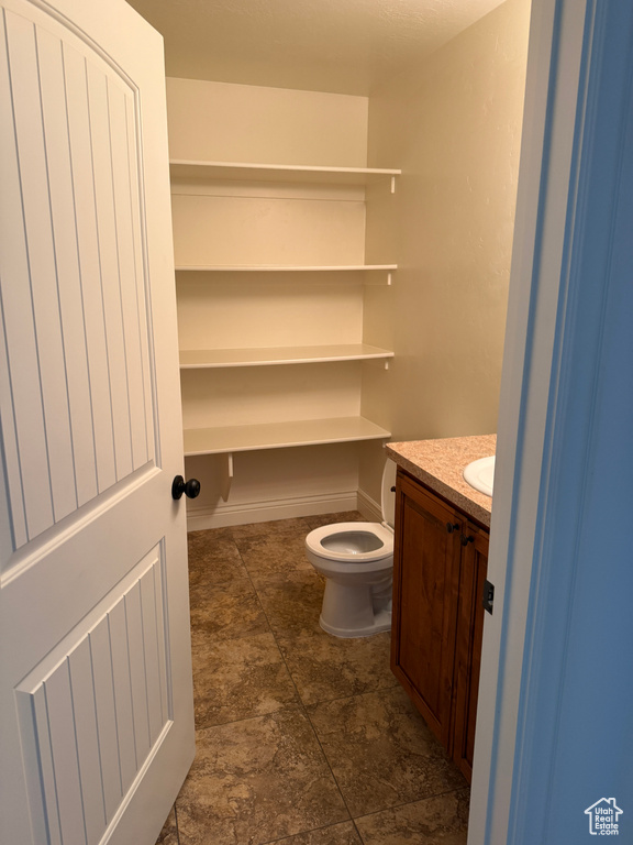 Bathroom featuring toilet and vanity