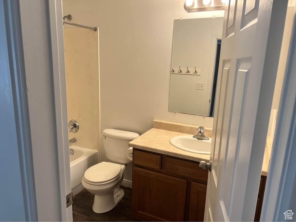 Full bath featuring vanity and tub / shower combination