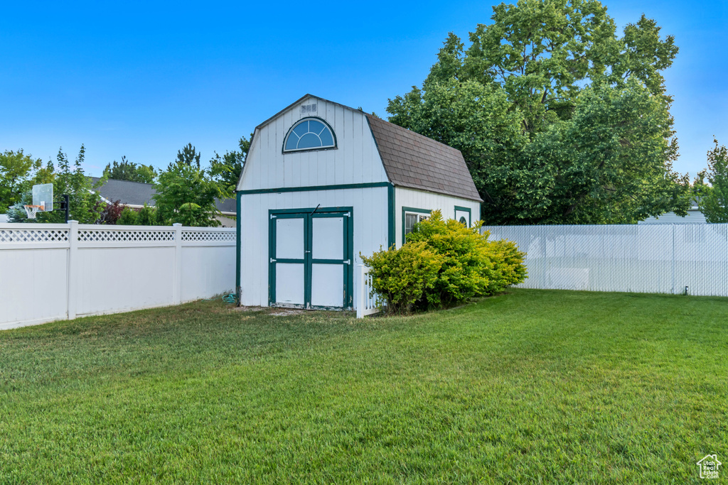 View of barn with a shed