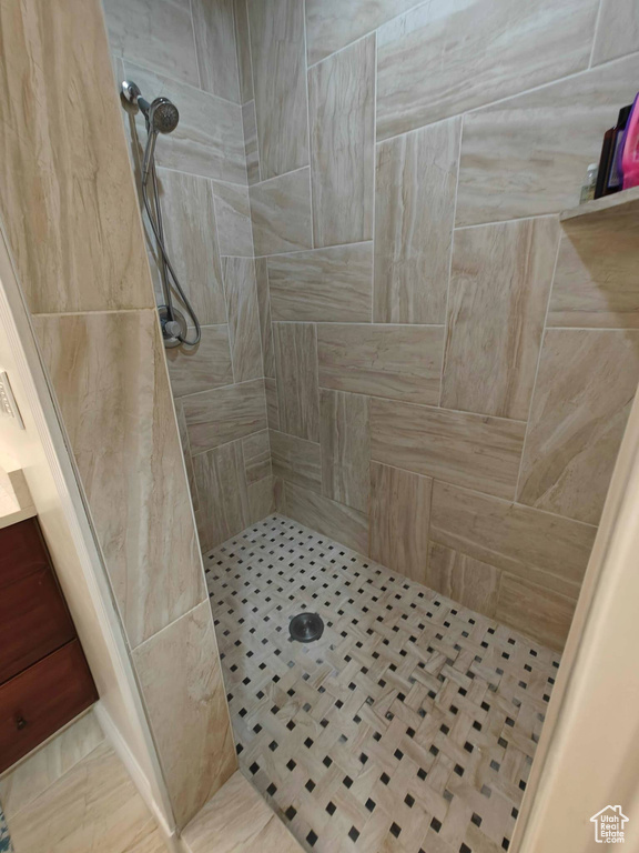 Bathroom with tiled shower