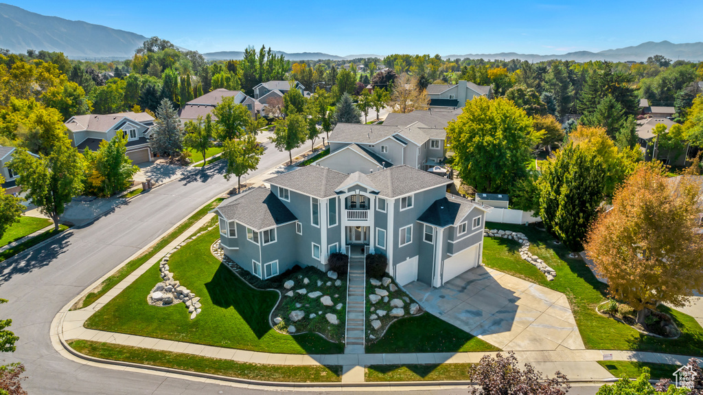 Birds eye view of property featuring a residential view and a mountain view