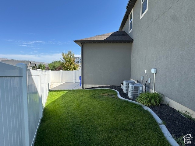 View of fenced backyard