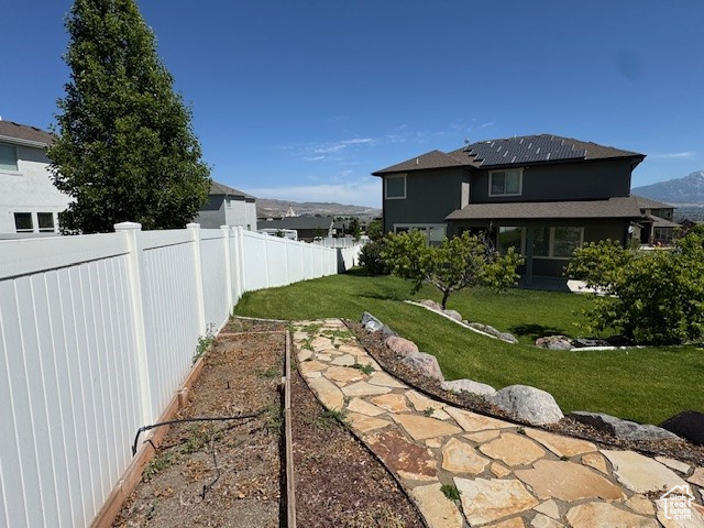 View of yard with a vegetable garden
