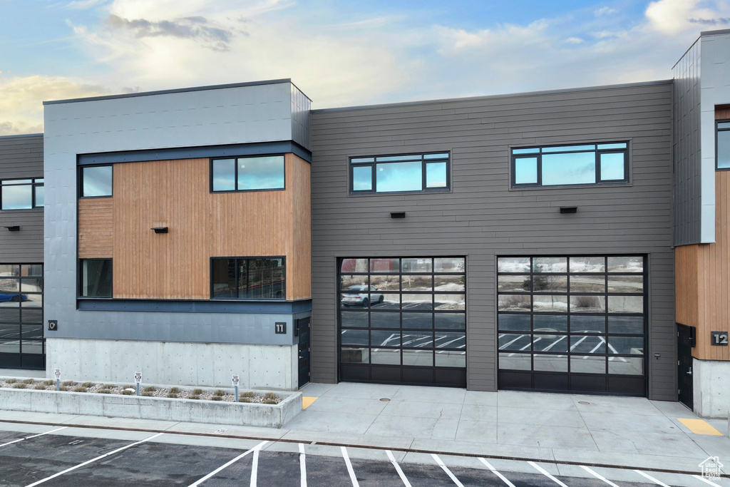 Exterior space featuring uncovered parking