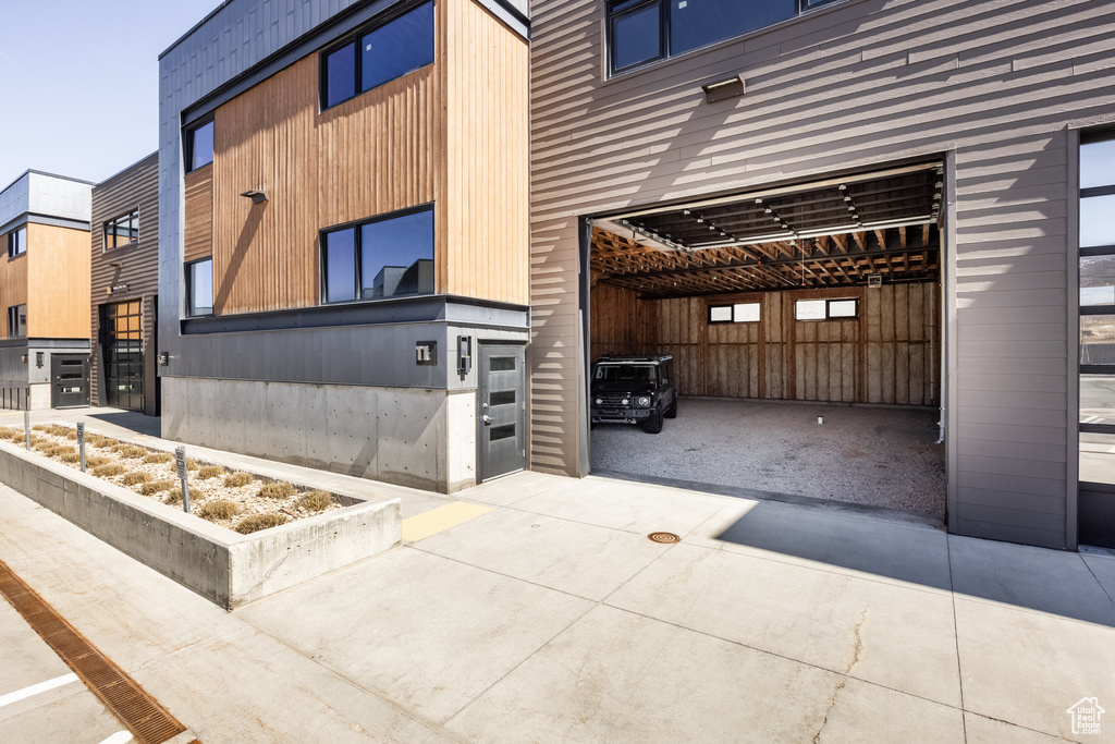 Garage with concrete driveway