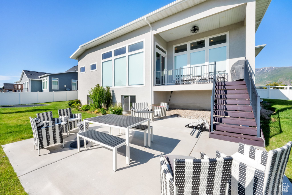 View of patio with stairs